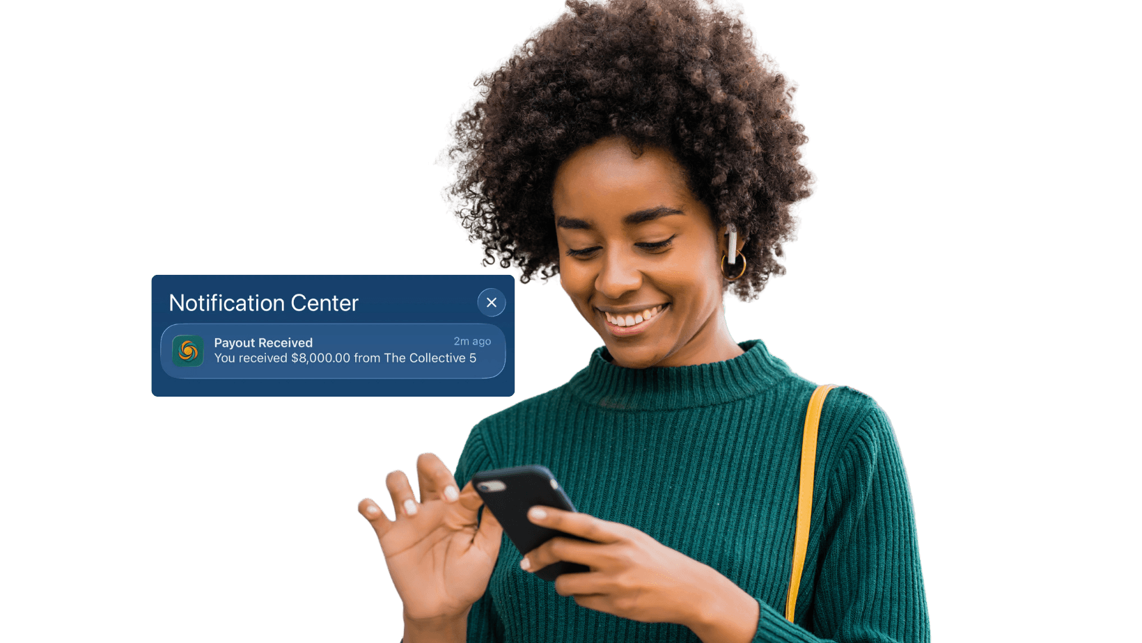 Woman smiling at her phone after receiving an $8,000 payout from Susu